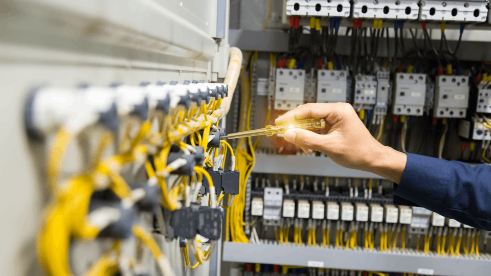 Worker performing electrical repair